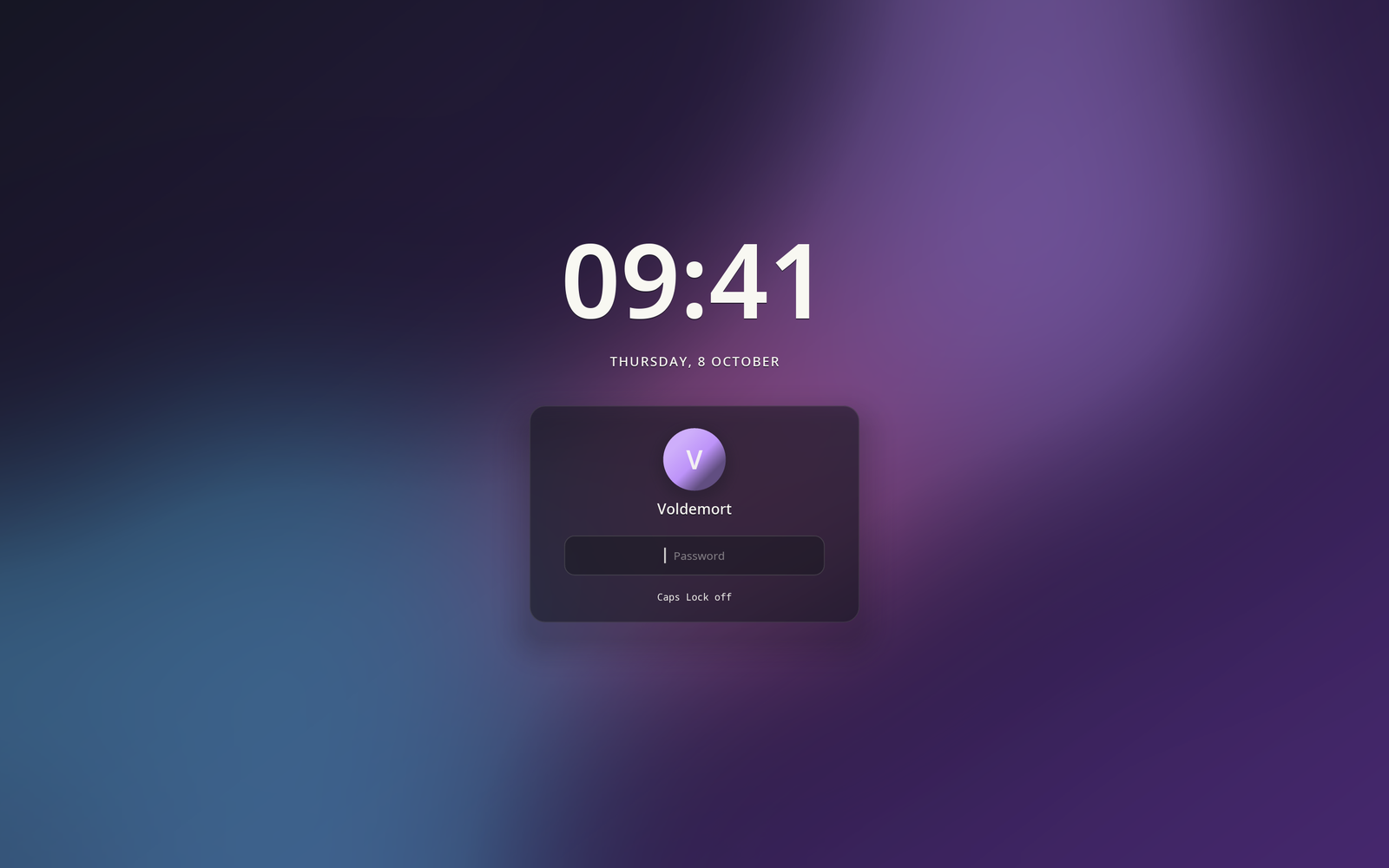 The greeter: the lock screen's card and clock, asking a user to log in