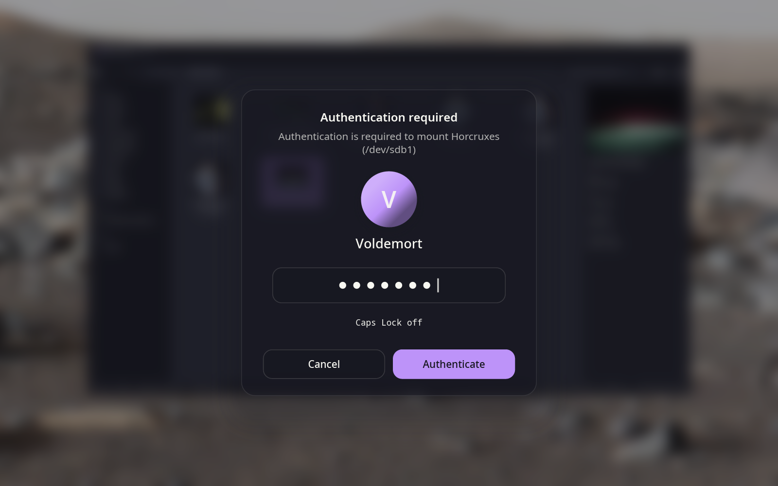 The administrator prompt: a card over the blurred desktop asking for Voldemort's password to mount a drive called Horcruxes, with Cancel and Authenticate